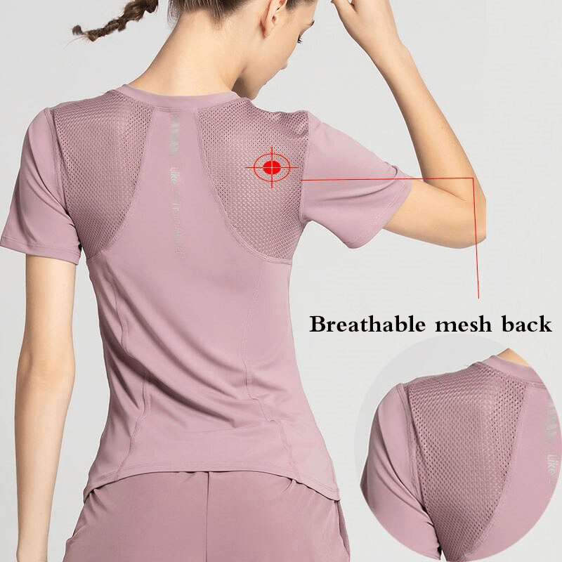 Woman wearing pink athletic round neck quick dry t-shirt with breathable mesh back, perfect for yoga. SF0111